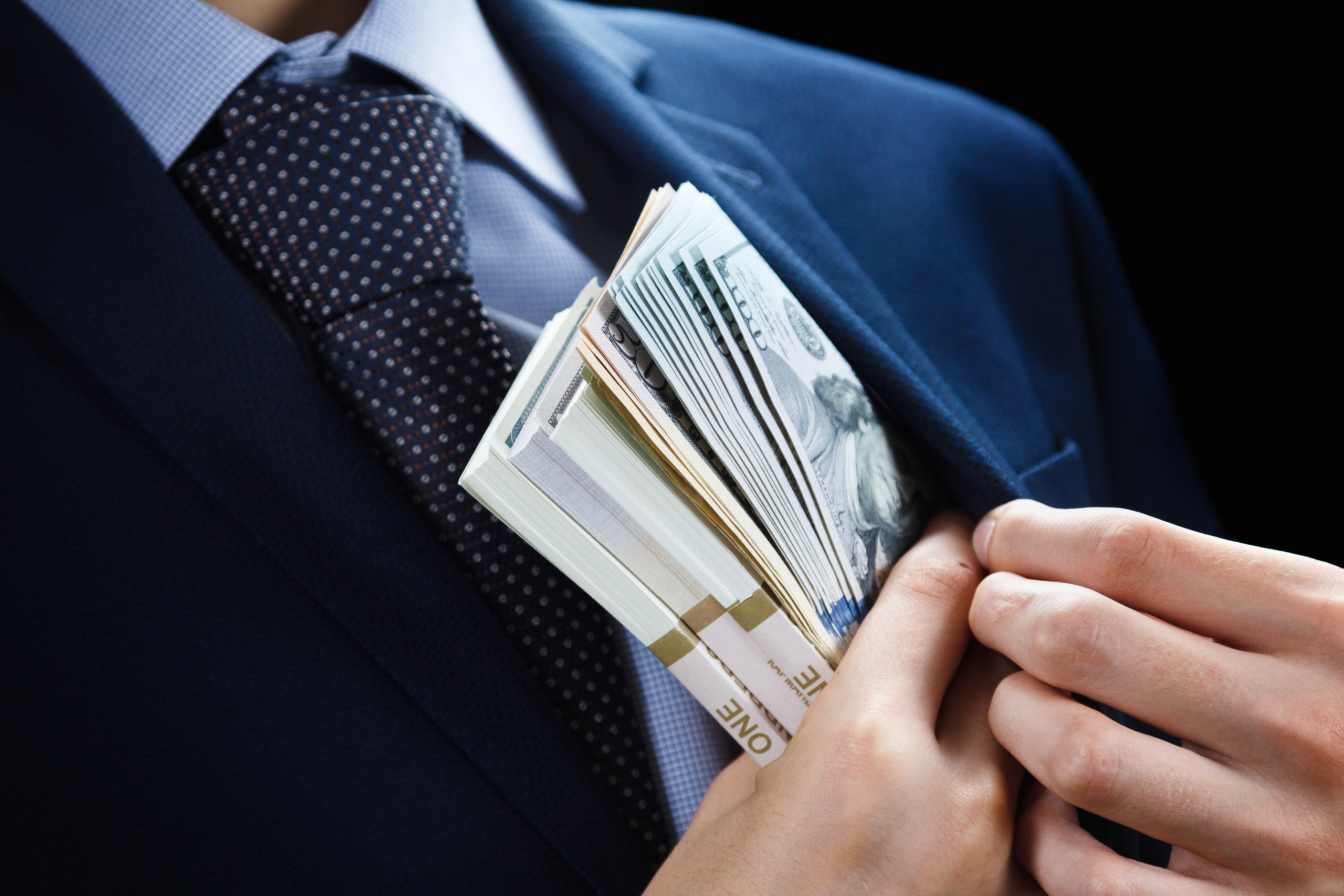 Bundle of dollar cash in hand